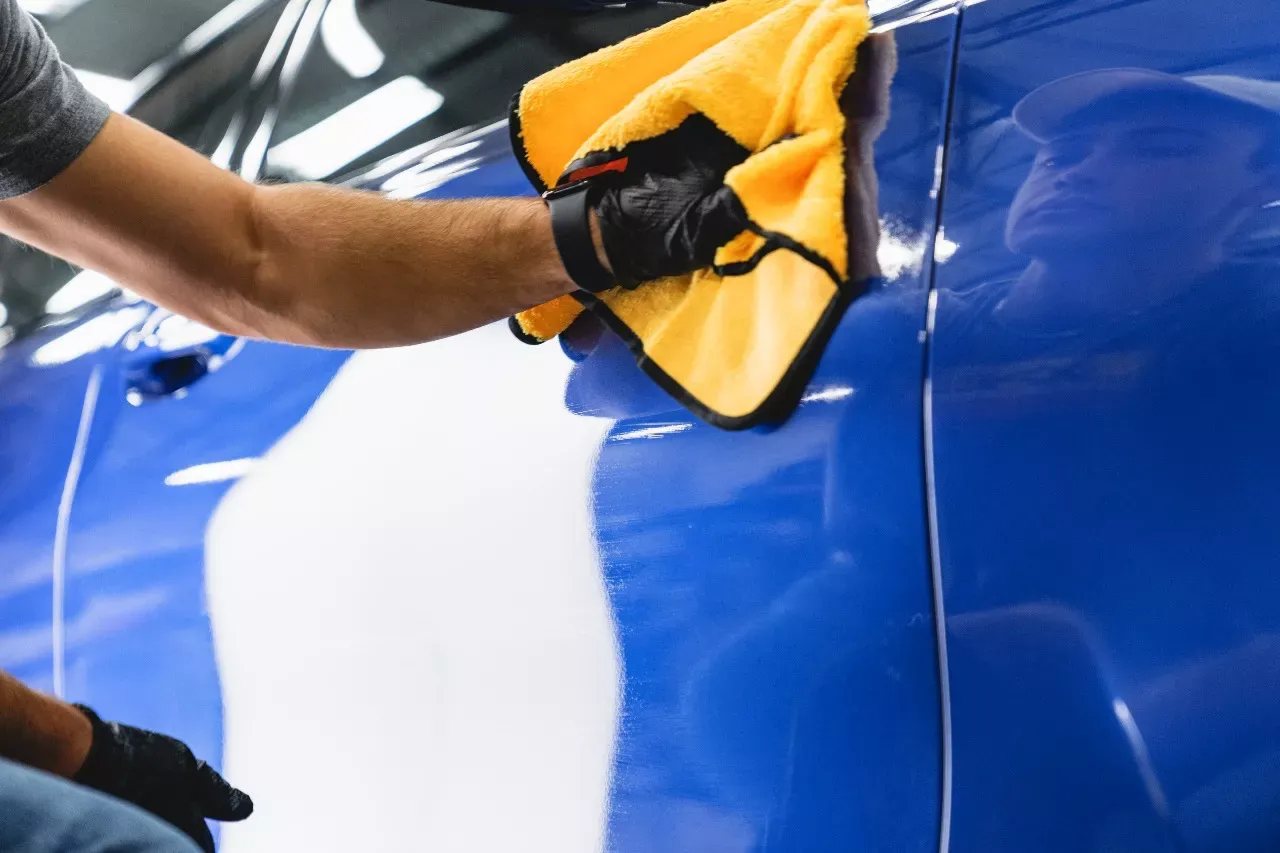 Ceramic coating being applied over paint
