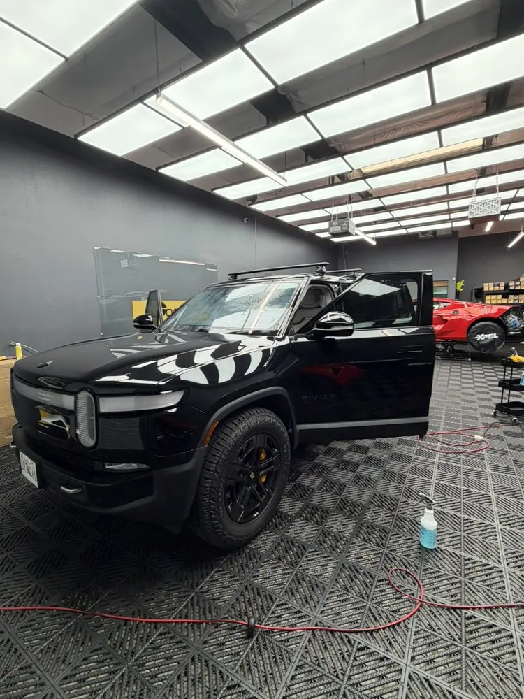 Black Rivian R1S in the Autograff studio, Rivian window tint and PPF in North Hollywood