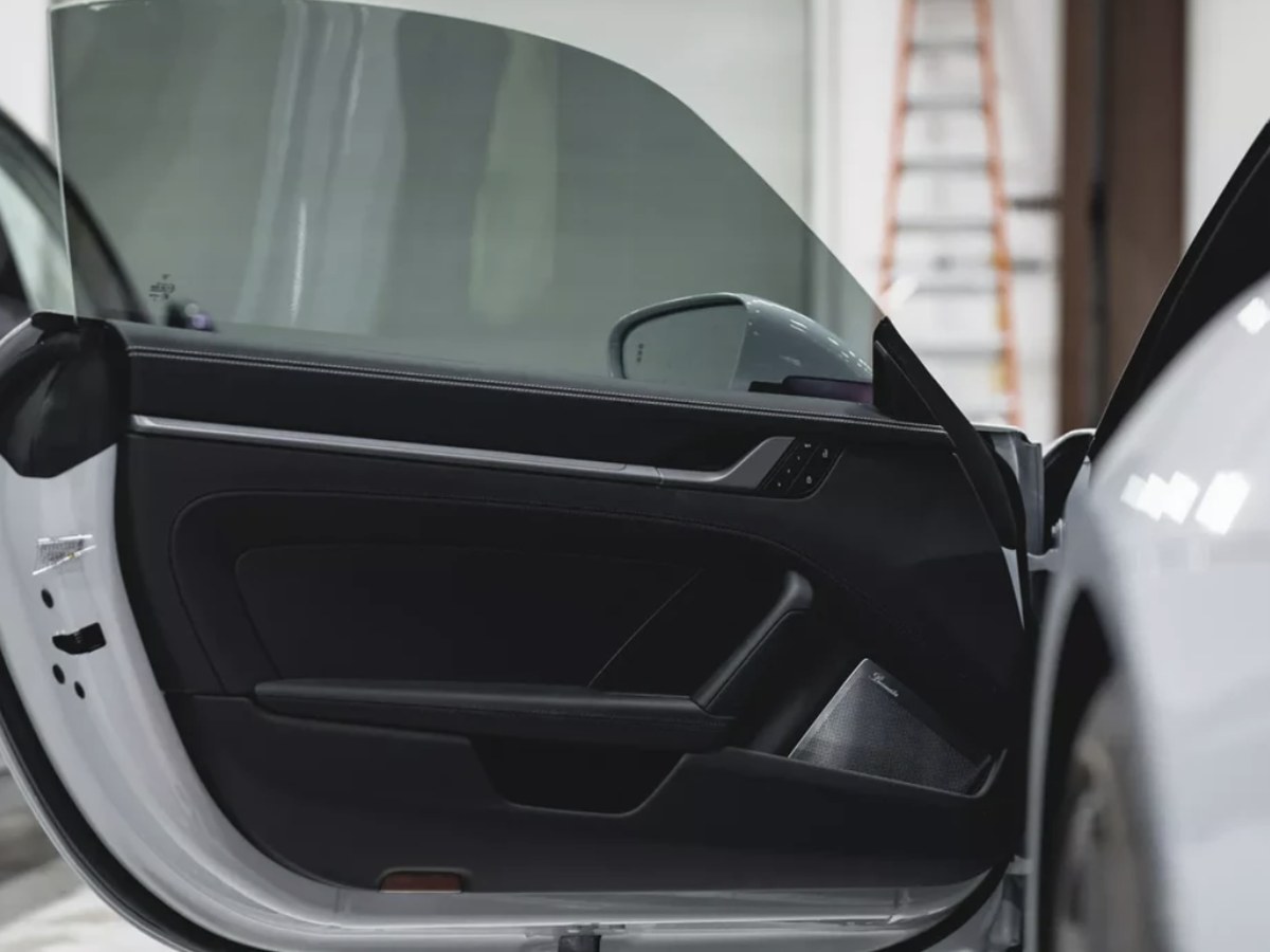 XPEL Prime CS carbon window tint on a car side window